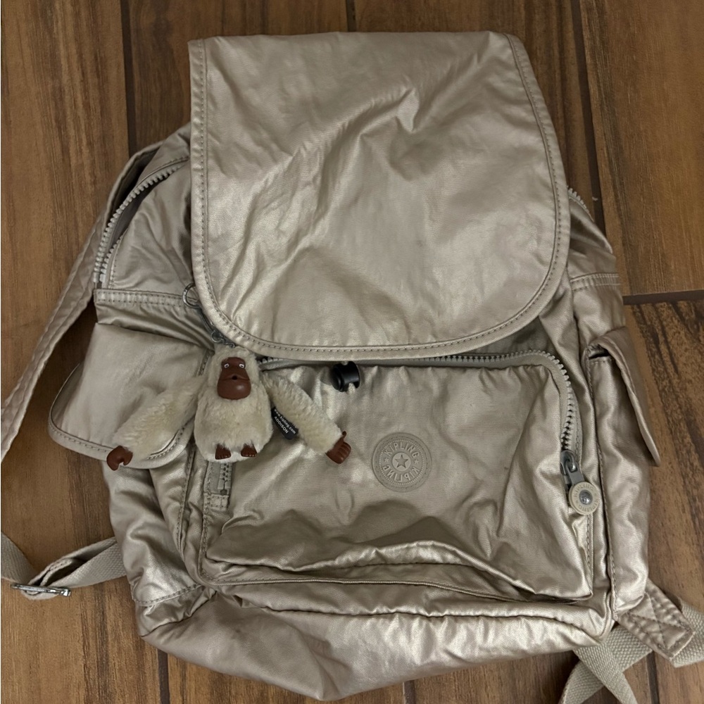Kipling Shimmering Taupe Backpack with Monkey Charm